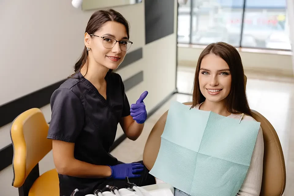 woman-is-happy-with-results-after-oral-hygiene-check